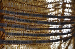 words threaded through sack-cloth